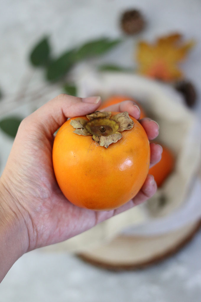 Festive Persimmon Carpaccio with Burrata and Arugula Salad | Foodology