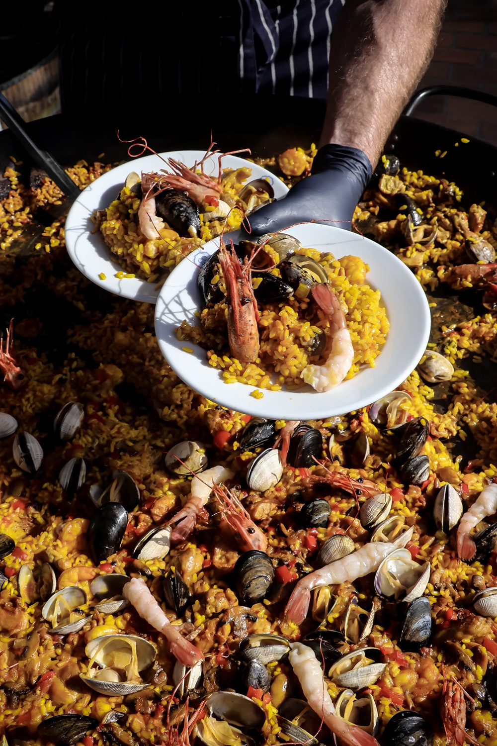 Como Taperia launches summer-long paella series with the Paella Guys ...